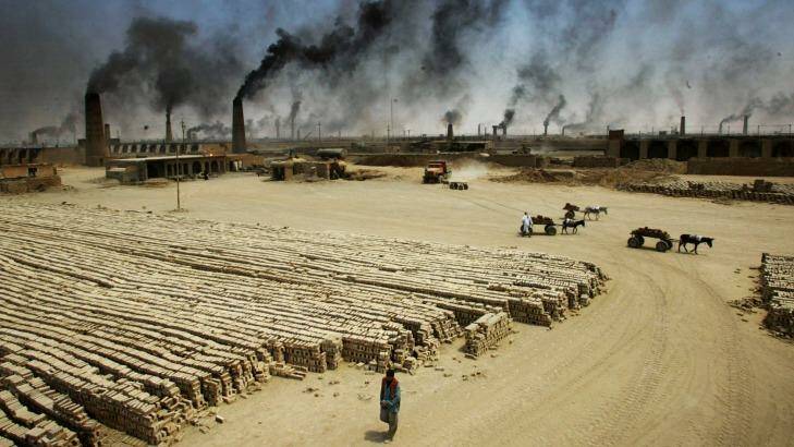 Hundreds of brick ovens creating the bricks needed for the rebuilding of Iraq in 2003. Photo: Jason South