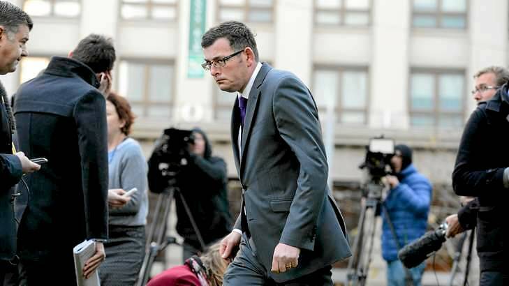 Daniel Andrews walks away outside Media House after facing the media over the dictaphone scandal. Photo: Justin McManus