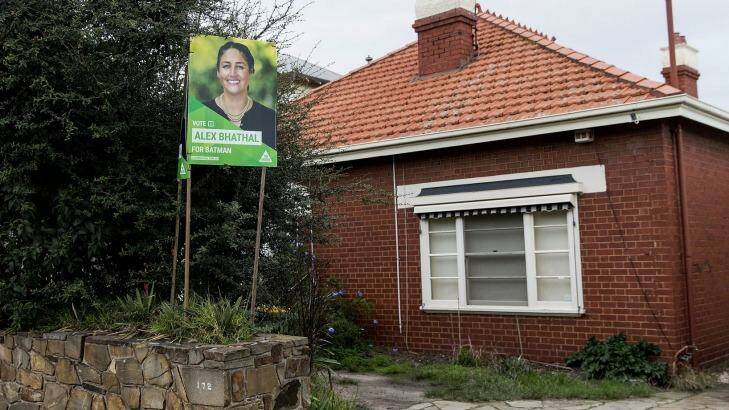 A placard for Batman Greens candidate Alex Bhathal erected by tenants of Labor MP David Feeney's investment property in Northcote. Photo: Paul Jeffers
