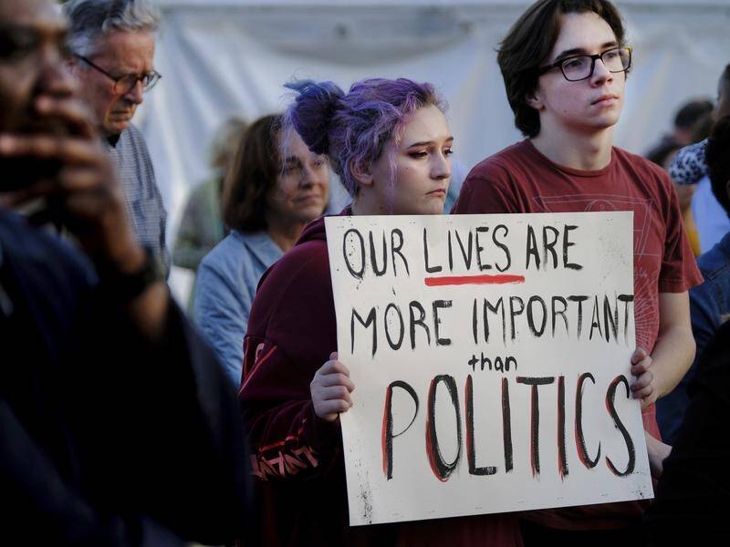 US teenagers are protesting for tougher gun laws after 17 were shot dead at a Florida high school.