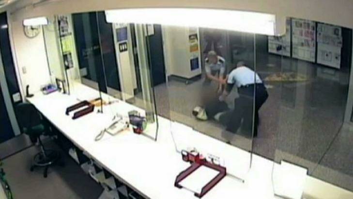 Still video images of one of the confrontations at Ballarat Police Station.