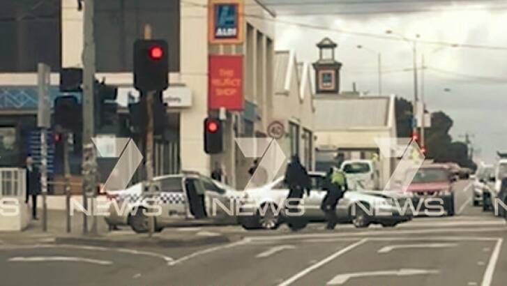 The scene after an Audi rammed a police car, police officer and a Subaru on Wednesday. Photo: 7 News
