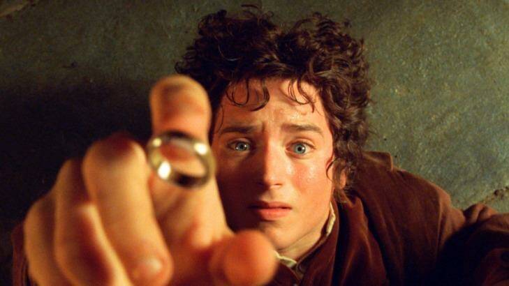 Elijah Wood's character Frodo reaches for the "One Ring", in the film the Fellowship of the Ring