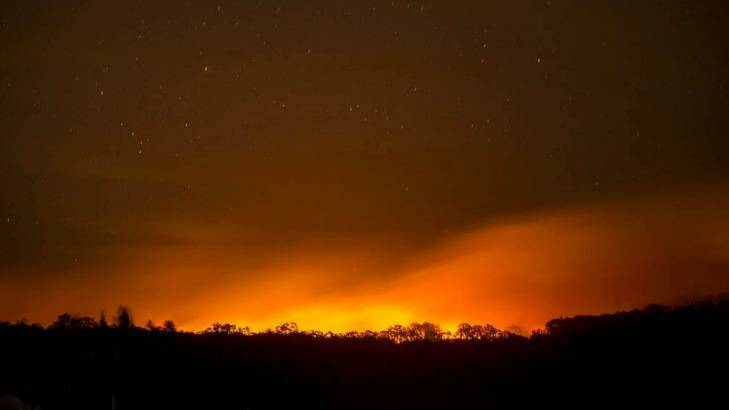 Firefighters were fighting the out of control Lancefield Cobaw fire on the ground and by air on Wednesday night.  Photo: Penny Stephens