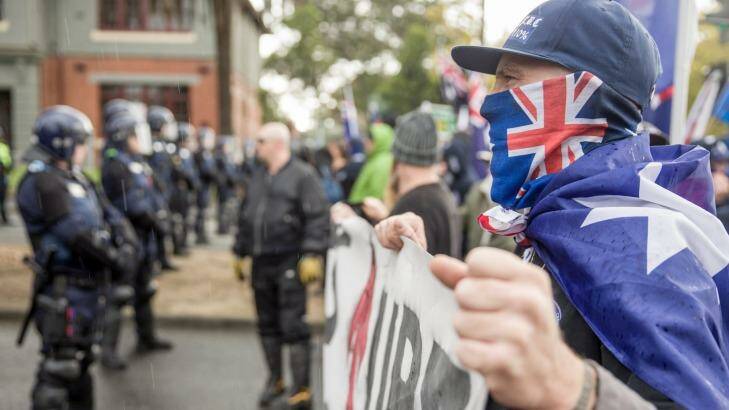 Protesters from rival anti-racism (Moreland Says NO To Racism) and anti-Islam (Stop The Far Left!) face off in Coburg on Saturday. Photo: Mathew Lynn