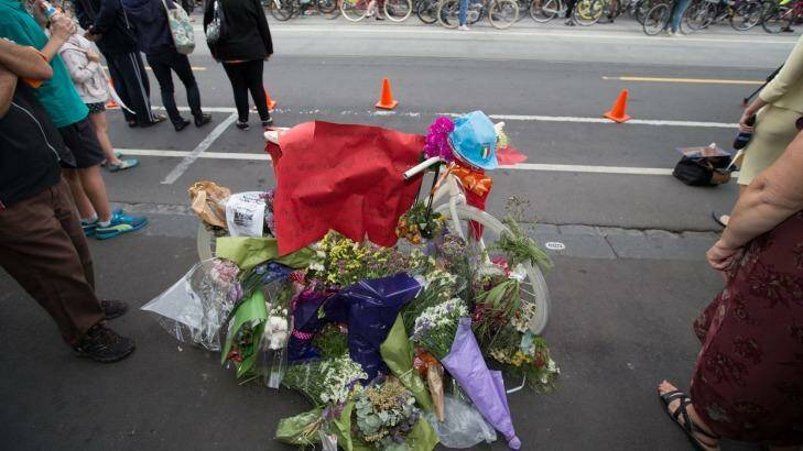 Flowers left on Sydney Road left in tribute to dooring victim Alberto Paulon. Photo: Jason South