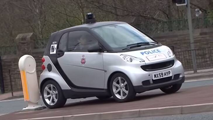 A Manchester police smart car with rooftop camera in action. They may soon be coming to a Victorian road near you. Photo: YouTube