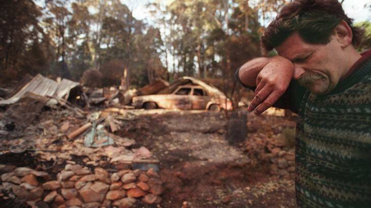 Ferny Creek resident Bill Frew after his house and car were destroyed in 1997. Photo: Joe Armao