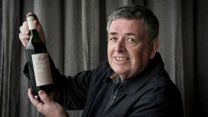 Alan Porter with his bottle of 1971 Penfolds Grange being tested at Carousel Restaurant in Albert Park. Photo: Jesse Marlow