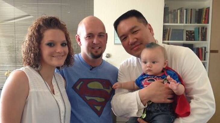 Mike and Heather Moore with their son, Memphis, and Dr Gordon Lee. Photo: Stanford Medical Center