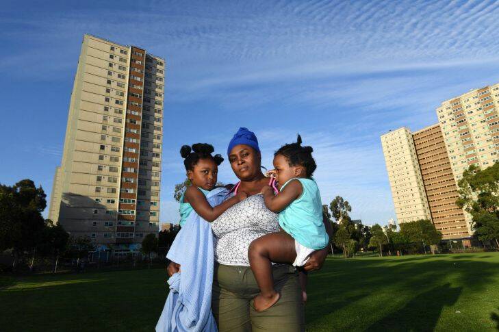 The Age, News, 29/03/2017 picture by Justin McManus. Fire in housing comission tower in Fitzroy.residents who have been evacuated from the building. Rita Hamonfore and kids Miracle and Savannah. Photo: Justin McManus