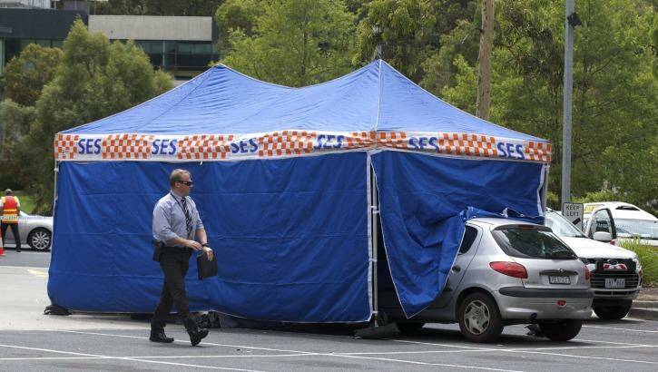 Police scene where a man died in the VicRoads car park in Burwood after an altercation following a minor accident. Photo: Simon O'Dwyer