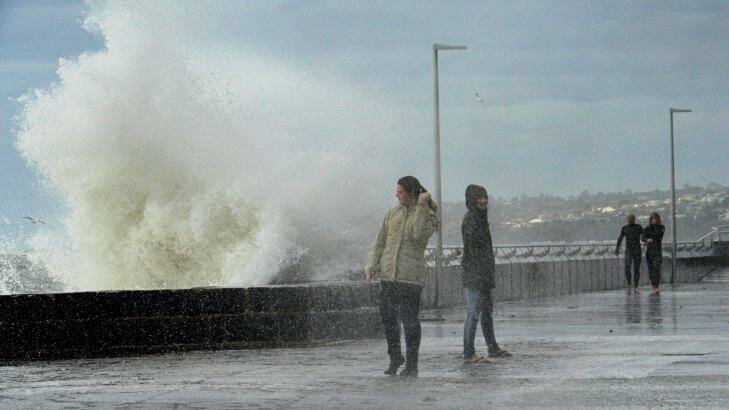 Large waves hit the Mornington Pier. Photo: Joe Armao
