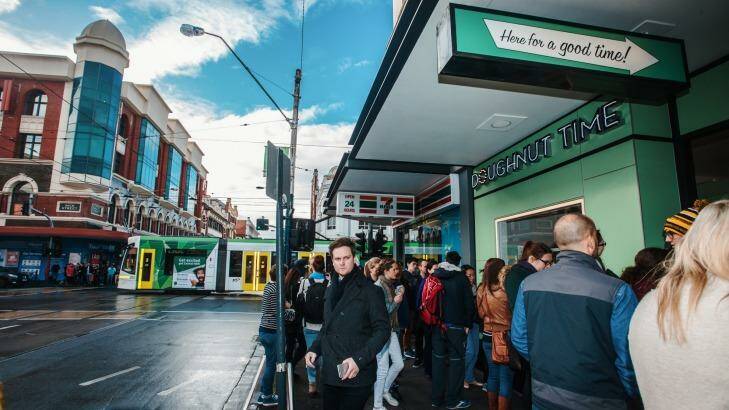 Crowds queue at the new Doughnut Time store in Chapel Street, Windsor. Photo: Supplied