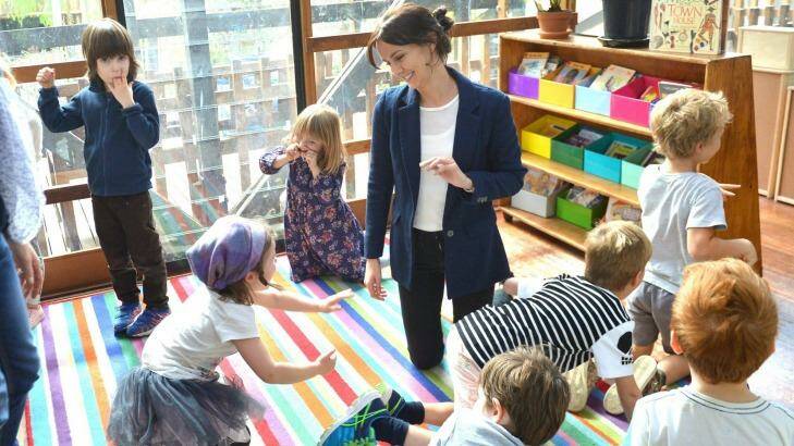 Preshil school teacher Rebecca Lewis engages in imaginary play with her class.  Photo: Joe Armao