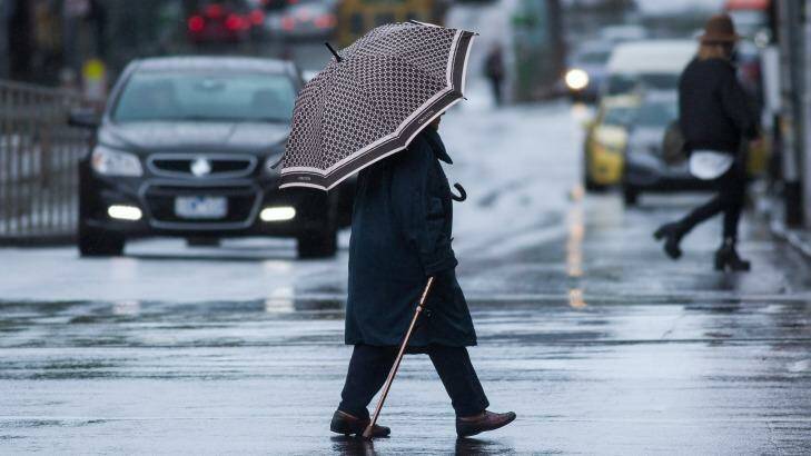 Melbourne's umbrellas can't catch a break. Photo: Paul Jeffers