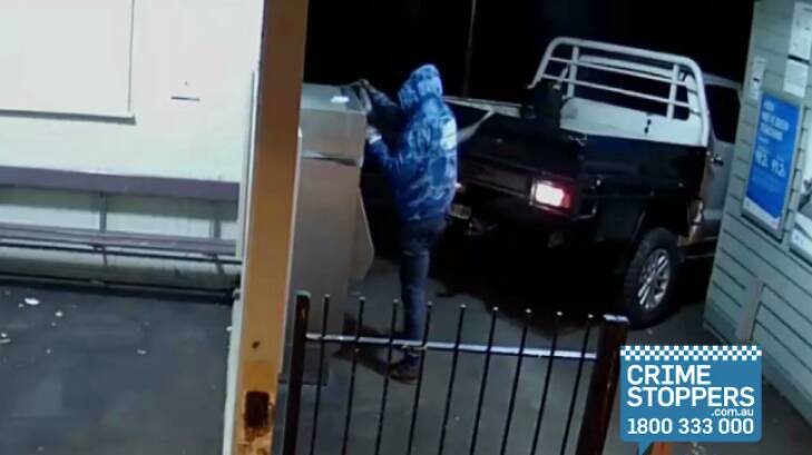 Two men have stolen a Myki machine from Burwood station. Photo: Crime Stoppers
