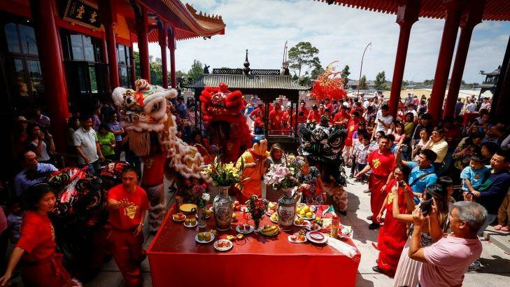 Food offerings and the lion dance for 2016 Lunar New Year celebrations at Bright Moon Buddhist temple in Springvale South.  Photo: Eddie Jim