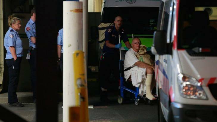 Patients being moved from the Epworth Hospital in Victoria Street after severe flooding. Photo: Chris Hopkins