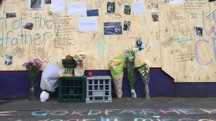 Tributes for Gordon Harvey - the 'Gordfather' - appeared outside his boarded-up shop. Photo: Tammy Mills