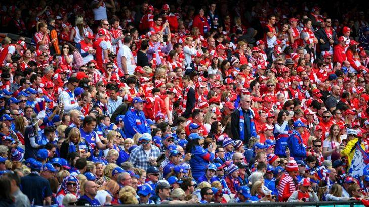 A Bulldogs fan had a heart attack as the final siren sounded. Photo: Eddie Jim