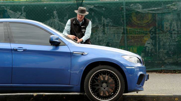 A City of Melbourne parking inspector on the beat. The council is waiving a growing number of fines issued to homeless people. Photo: Craig Abraham CMA