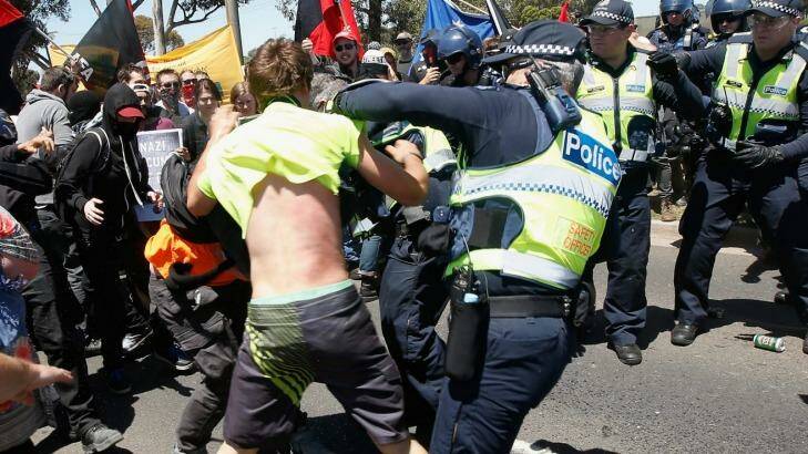 Protesters from Reclaim Australia and the No Room for Racism group clash  during a rally held in Melton in November last year. Photo: Darrian Traynor