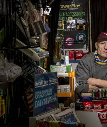 Peter Kennedy has run his kiosk on Collins Street for 25 years, but has increasingly struggled to keep the business viable. Photo: Eddie Jim
