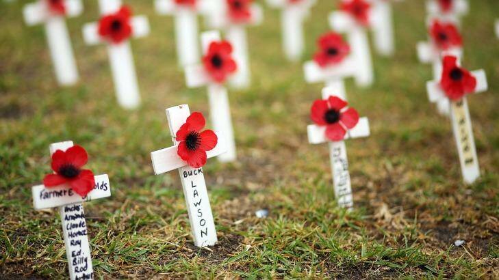 Poppies are seen prior to the ANZAC Day service at Port Melbourne. Photo: Graham Denholm