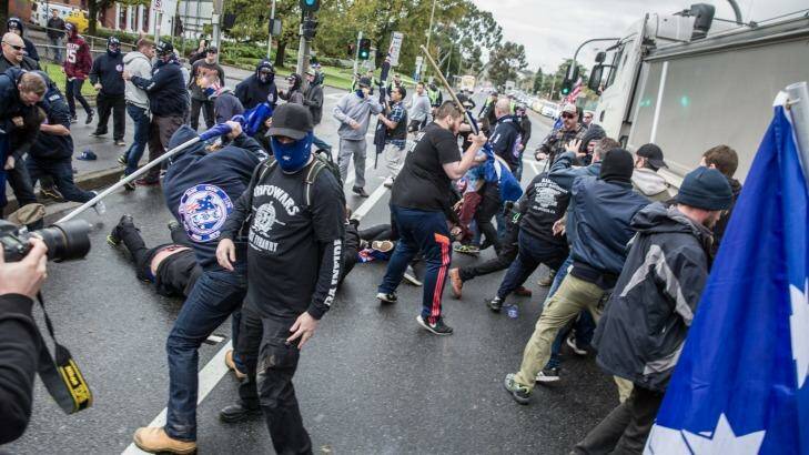 Protesters from rival anti-racism and anti-Muslim groups clash in Coburg on Saturday. Photo: Mathew Lynn
