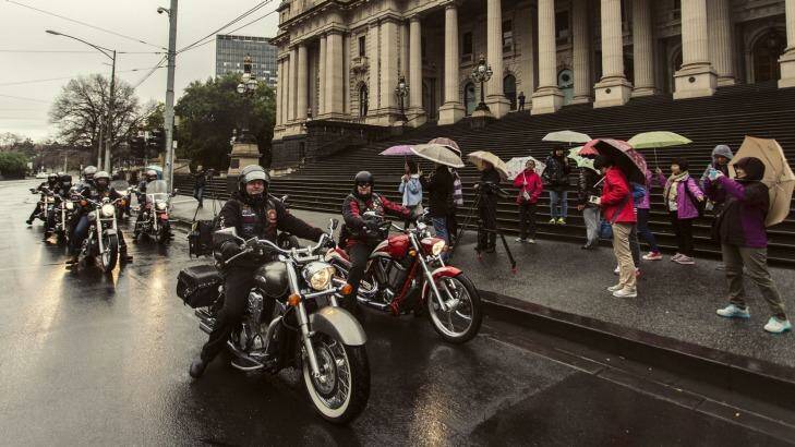 Tourists stopped to take photos of the protesting riders. Photo: Meredith O'Shea