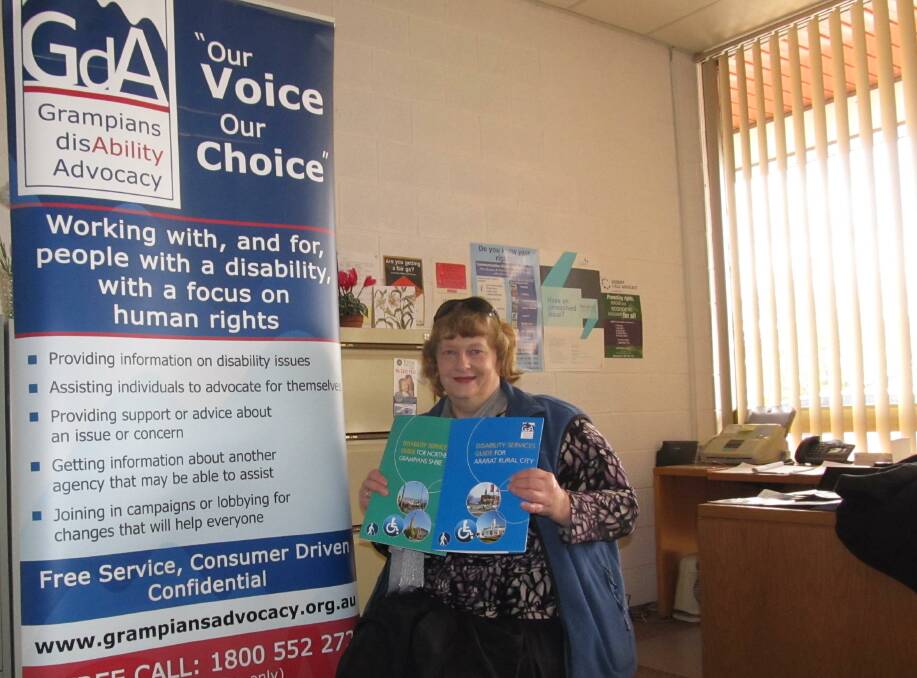 SPREADING THE WORD: Jenni Starick, chair of the board of Grampians disAbility Advocacy, displays one of the new books that the service has published. 