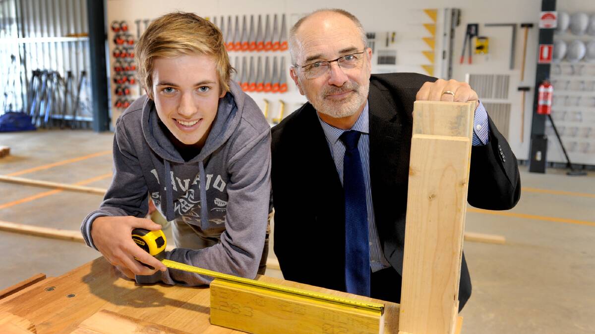 INVESTING IN THE FUTURE: Skillinvest chief executive John Ackland, last year, right, with then Horsham College year 11 student Hugo Paps. Picture: SAMANTHA CAMARRI