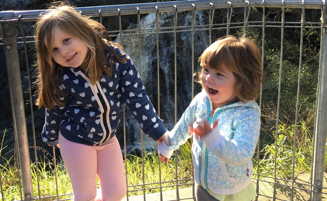 SISTERLY LOVE: Ava, 4, and Sadie Lester, 2, shortly before Ava's leukimia diagnosis uprooted the family to Melbourne for treatment.
