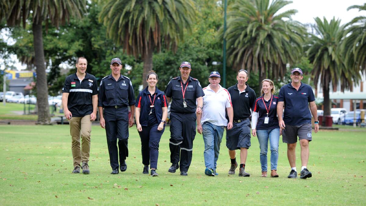 TOGETHER: CFA staff and volunteers walked around Horsham's May Park to raise awareness for post traumatic stress disorder. Picture: SAMANTHA CAMARRI 