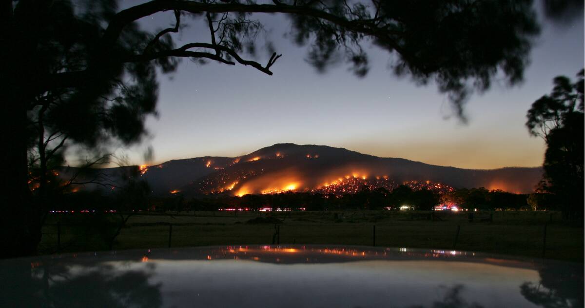 WELL ALIGHT: Fires burn across the hills near Pomonal during the 2006 bushfires. Grampians residents can undertake permit free burn offs in October.