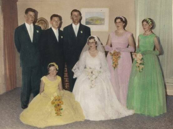 WEDDING BELLS: Brian and Beth Kuchel with their wedding party 60 years ago. They celebrated their diamond anniversary with some of the same friends at the weekend. 