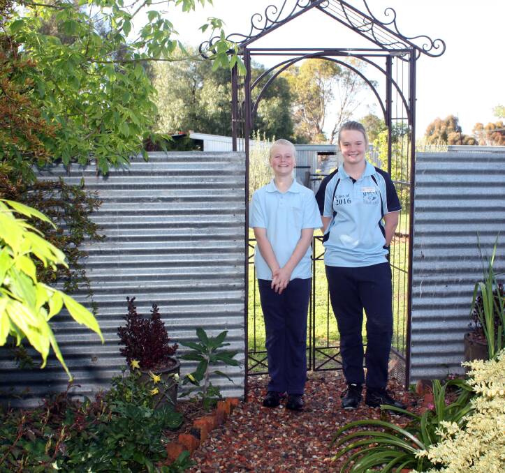 GREEN THUMBS: Alexa and Kiara Cameron are the youngest of three generations participating in this weekend's Marnoo open gardens. Picture: CONTRIBUTED 