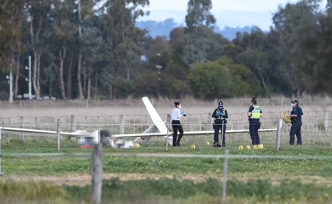 TRAGEDY: Police on scene after a fatal glider crash in Benalla. Picture: MARK JESSER