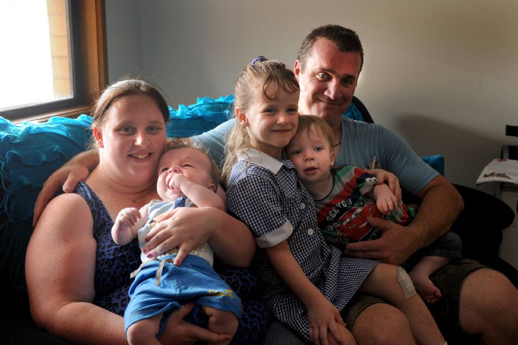 STRONG: Angela and Anthony Frawley with their three children Connor, 19 months, Mia, five and Jeremy, six months. Anthony, Connor and Mia have Cowden Sydrome and Jeremy is being tested for the condition. Picture: SAMANTHA CAMARRI