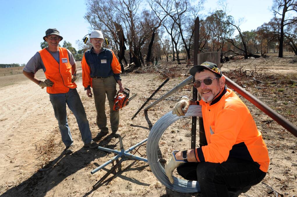 BlazeAid volunteers Don Pattinson, Charlie Corsor and Graham Pyper at work near Laharum. Picture: PAUL CARRACHER