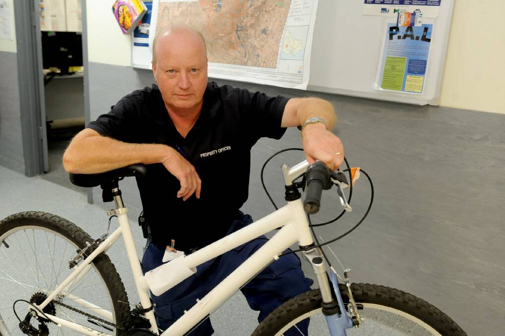 Property Ofﬁcer Rick Smith with an unclaimed bike at Horsham Police Station. Police have reported a spike in bicycle thefts in Horsham this year. Picture: SAMANTHA CAMARRI
