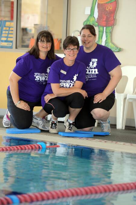 IN THE POOL: Swimathon committee members Wendy Heath, Kylie Zelley and Tammy van Duren get ready for Horsham Aquatic Centre's swimathon on Sunday. Picture: PAUL CARRACHER