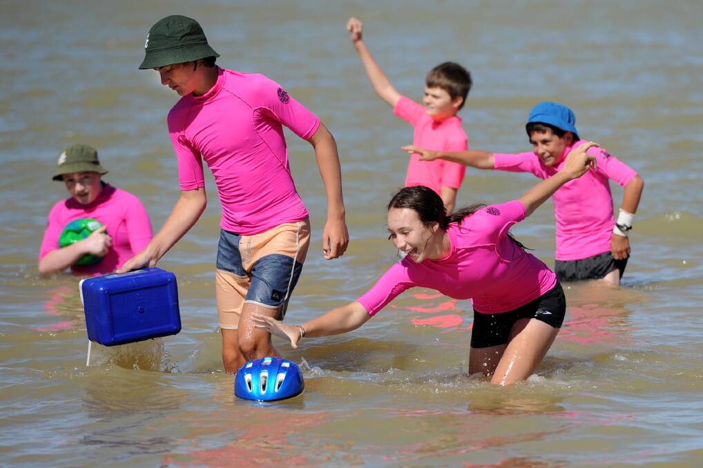 MAKING A SPLASH: St Brigid's College students Alastair English, Matt Lloyd, Maddison Rethus, Merlin Pritchard and Sean Wouters learn about rural water safety at Life Saving Victoria’s Open Water Learning Experience at Taylors Lake. Picture: SAMANTHA CAMARRI