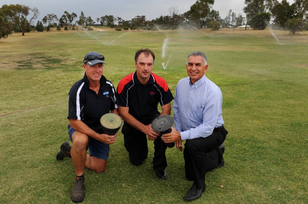 IN WITH THE NEW: From left, Horsham Golf Club superintendent David 
Gove, Scott Petroleum representative Gavin Walter and club president David 
Lavithis are hoping to raise money for a new sprinkler system with a tournament 
on Sunday. Picture: PAUL CARRACHER
