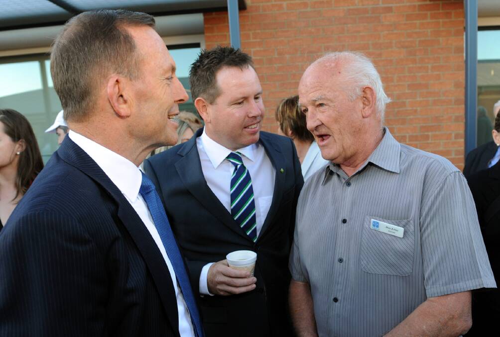 SIGNIFICANT STEP: Wimmera Health Care Group Foundation chairman Don Johns meets Prime Minister Tony Abbott and Member for Mallee Andrew Broad yesterday. Picture: PAUL CARRACHER