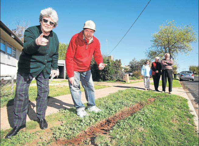ANGER: Winifred and Hutchinson street residents are fed up with hoon behaviour on their streets. Val Stewart and Tony Grabau on one of the ripped-up nature strips are supported by Barbara Bennett and Noreen and Harold King. Picture: AMANDA WILSON