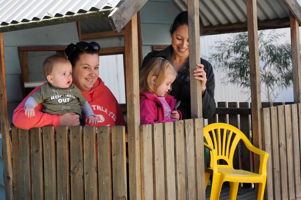 FAMILY TIME: Sammy-Jo Molley spends time with her two children Cheston, seven months, and Indi-Rose, 2, along with Wimmera Uniting Care Young Parents Group facilitator Lauren Ellis. Picture: BELLA BROWN