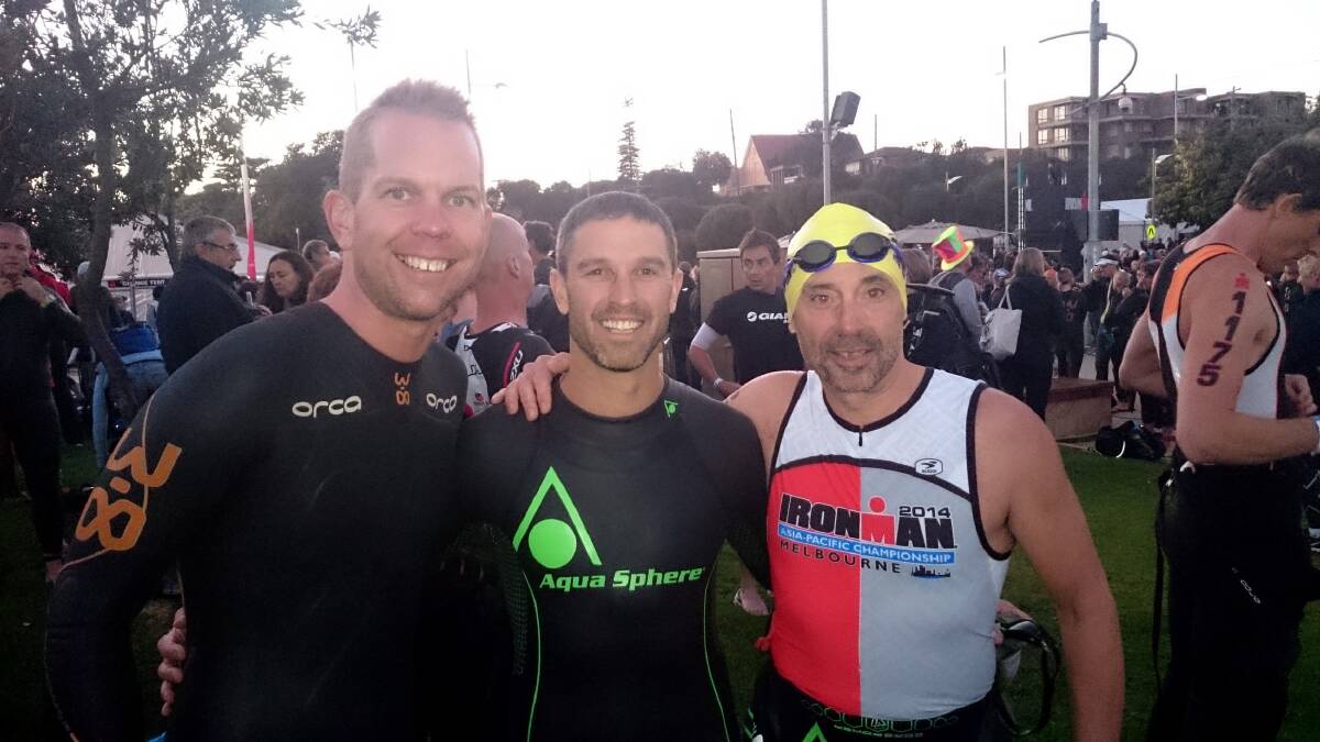 Horsham triathletes Cameron Evans, Mark Pumpa and Campbell Pallot band together at the Ironman event in Melbourne on Sunday.