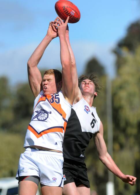 DRAFT HOPEFUL: Edenhope-Apsley and North Ballarat Rebels product Oscar McDonald, right, spoils Calder Cannon and fellow AFL draft prospect Peter Wright during a TAC Cup match in Horsham this year. Picture: PAUL CARRACHER